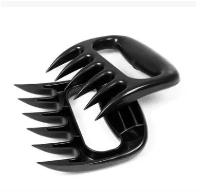 Black bear claw meat shredder fork for barbecue and kitchen use with decorative patterns.