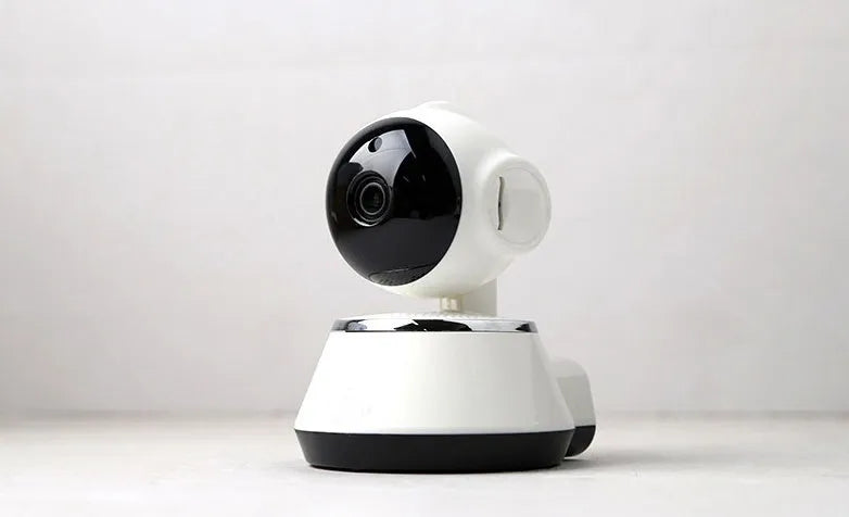 White WiFi wireless baby monitor camera with 720P HD, pan tilt, night vision, and two-way audio.