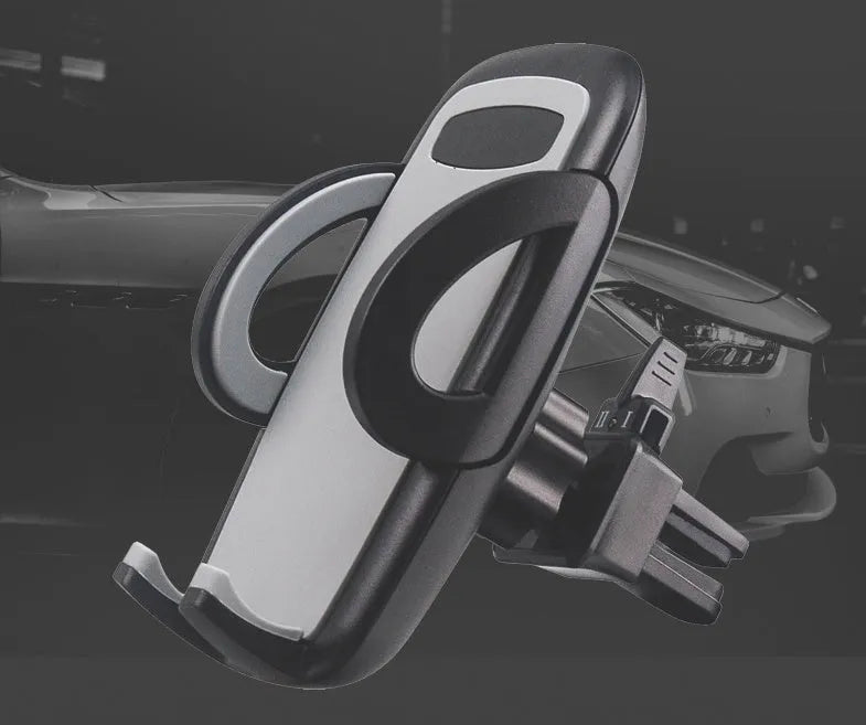 Black plastic car phone holder mounted on air conditioning vent holding smartphone