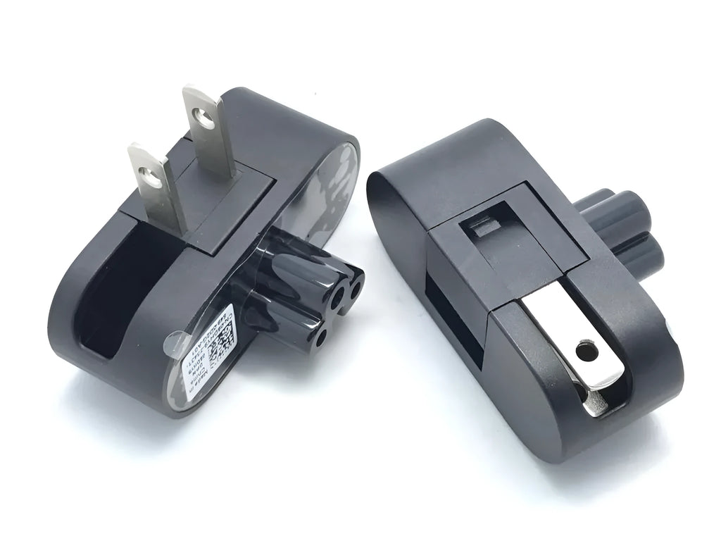 Black folding US plug for laptop chargers showing straight and 90-degree angled positions.