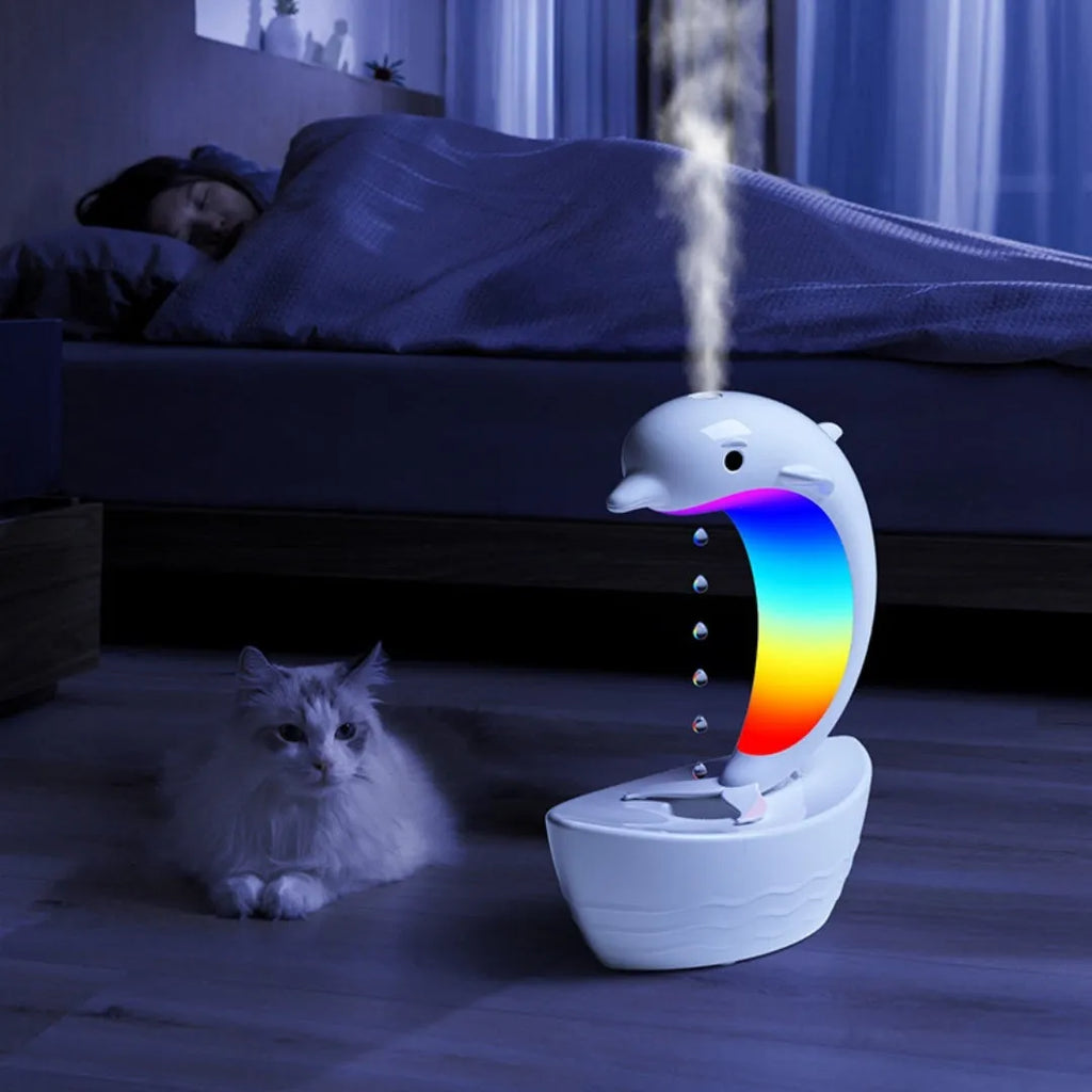 Dolphin-shaped Bluetooth speaker humidifier in white with fine mist output and sea light glow