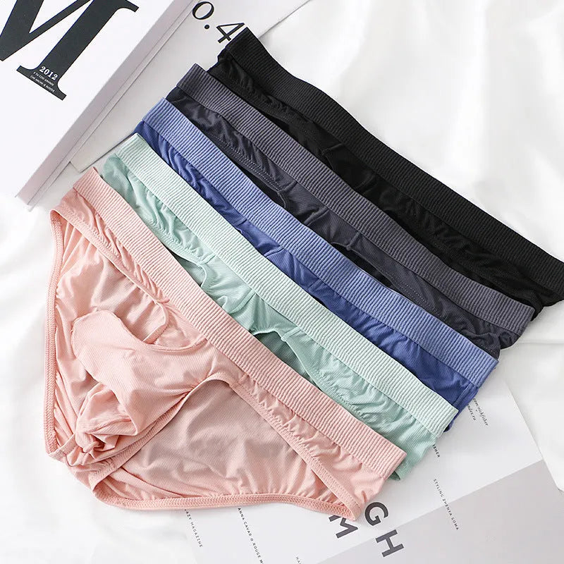 Men's low waist ice silk briefs in black, grey, light green, pink, and purplish blue colours on a size chart.