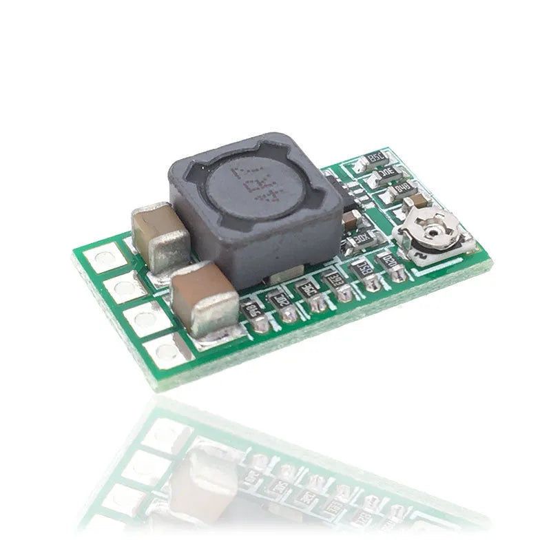 Green 25x21mm DC-DC buck converter module for 12-24V to 5V conversion