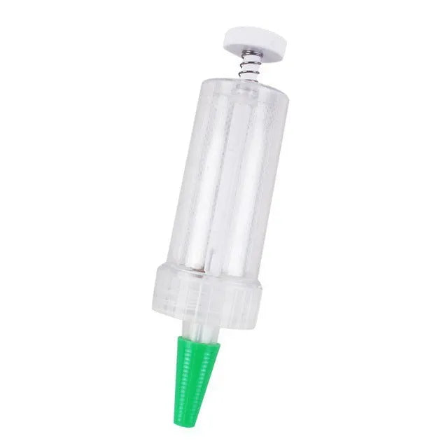 Compact 12 cm long plastic mini planter tool for sowing seeds in pots and trays.