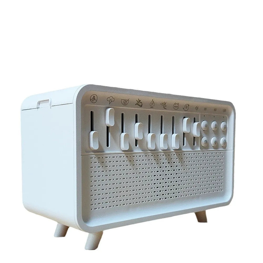 White geometric all-in-one Bluetooth speaker, humidifier, white noise machine and night light on a surface.