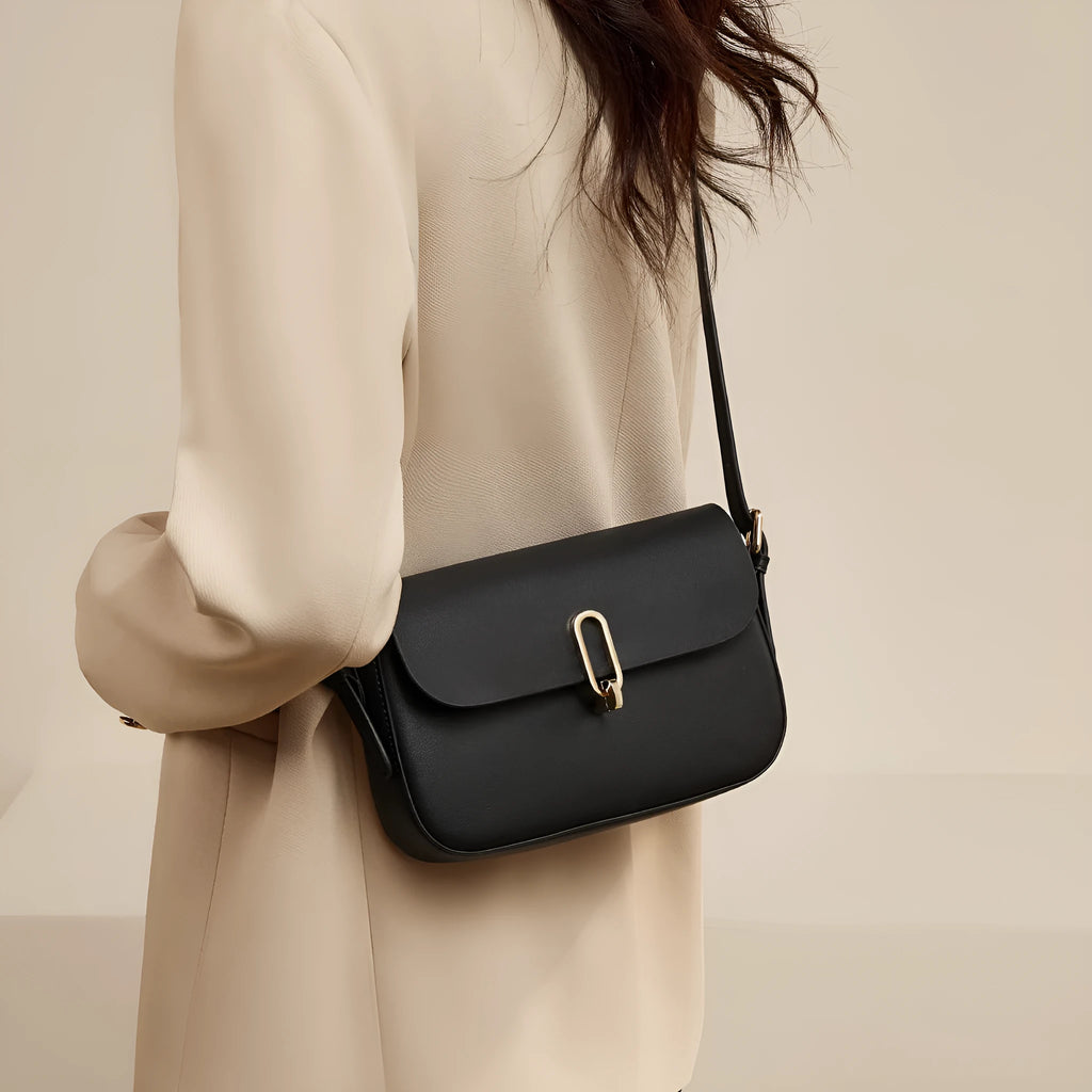 Black genuine leather square messenger bag with shoulder strap and lock detail