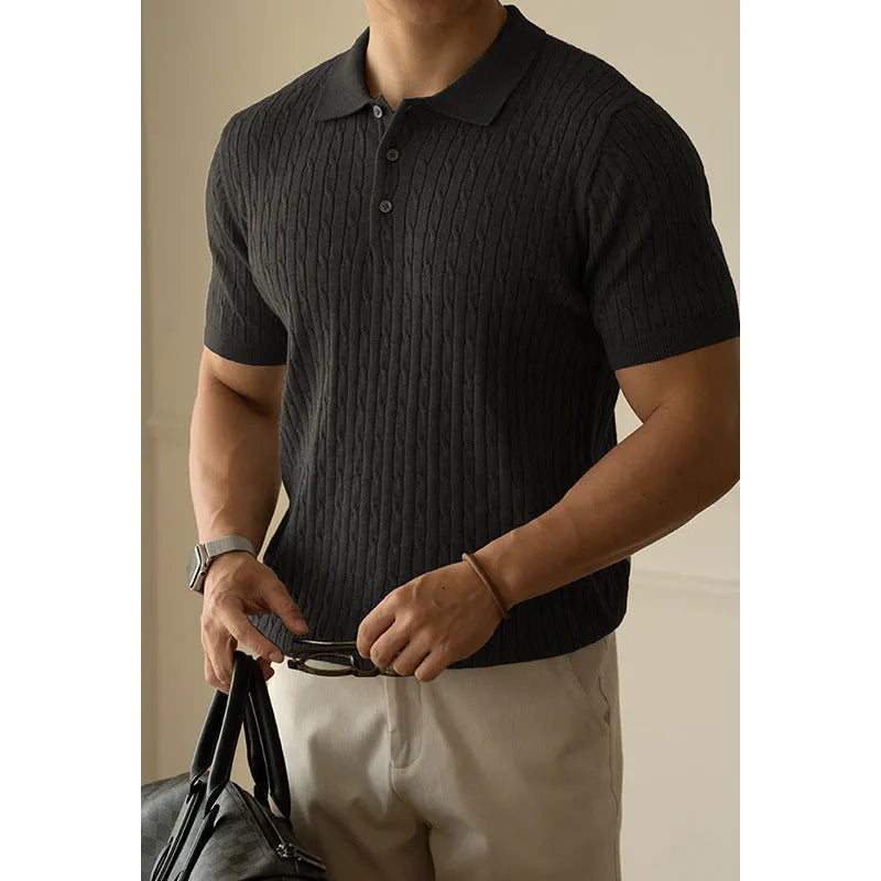 Men's khaki short sleeve business casual top laid flat, showing collar and button placket detail.