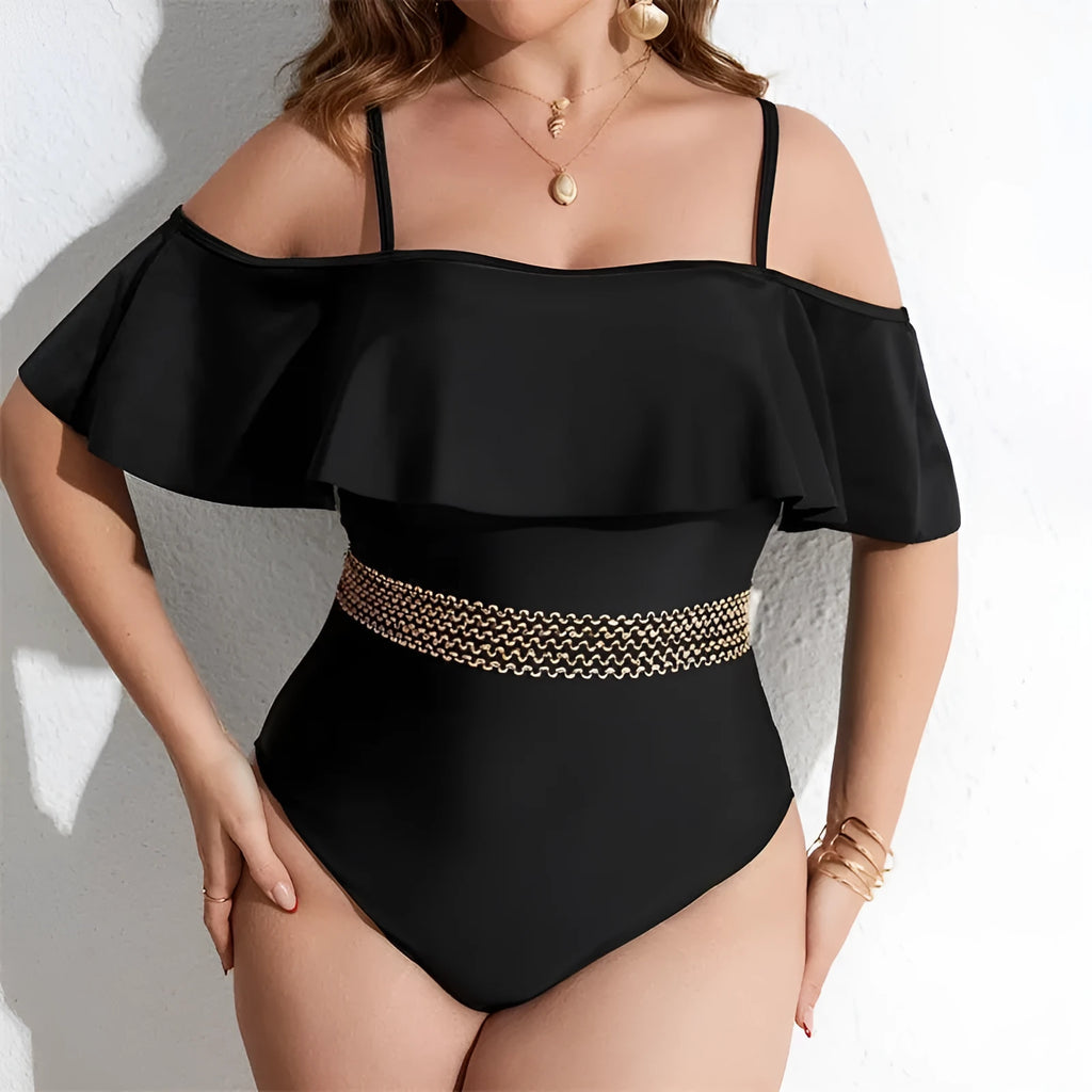 Black solid colour women's one-piece swimsuit on a hanger, polyester fabric, for swimming.