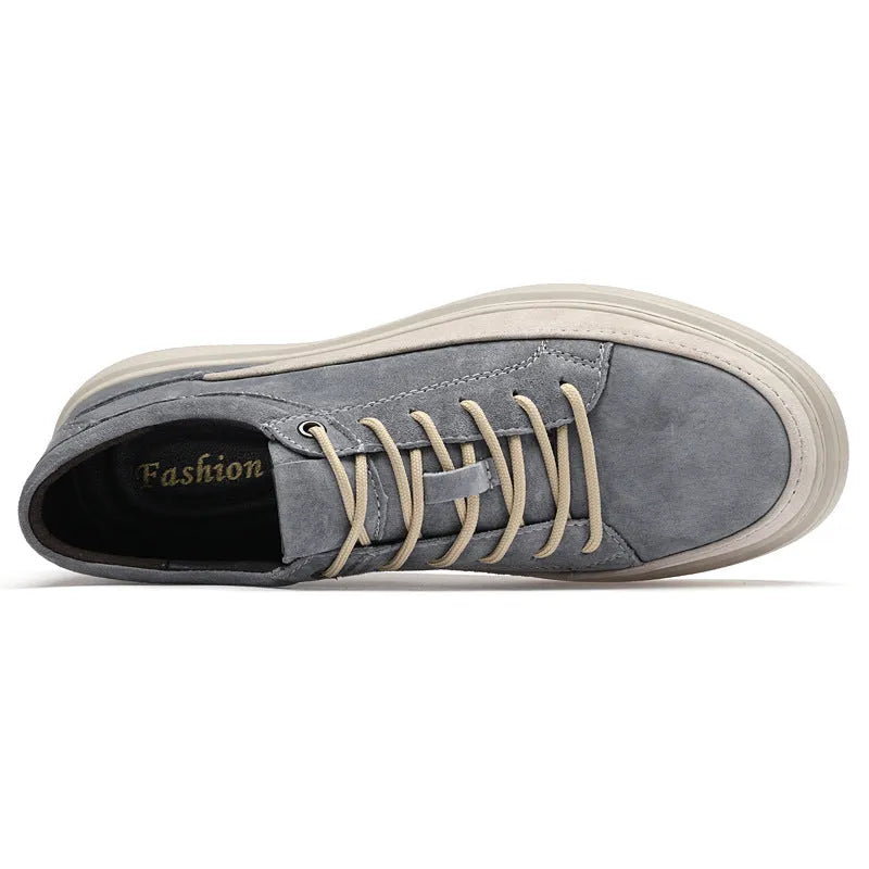 Men's grey casual leather skate shoes with a round toe and front lace-up on a soft rubber sole.