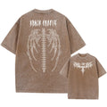 Men's oversized loose-fit cotton t-shirt in a light colour on a hanger, showing drop-shoulder sleeve design.