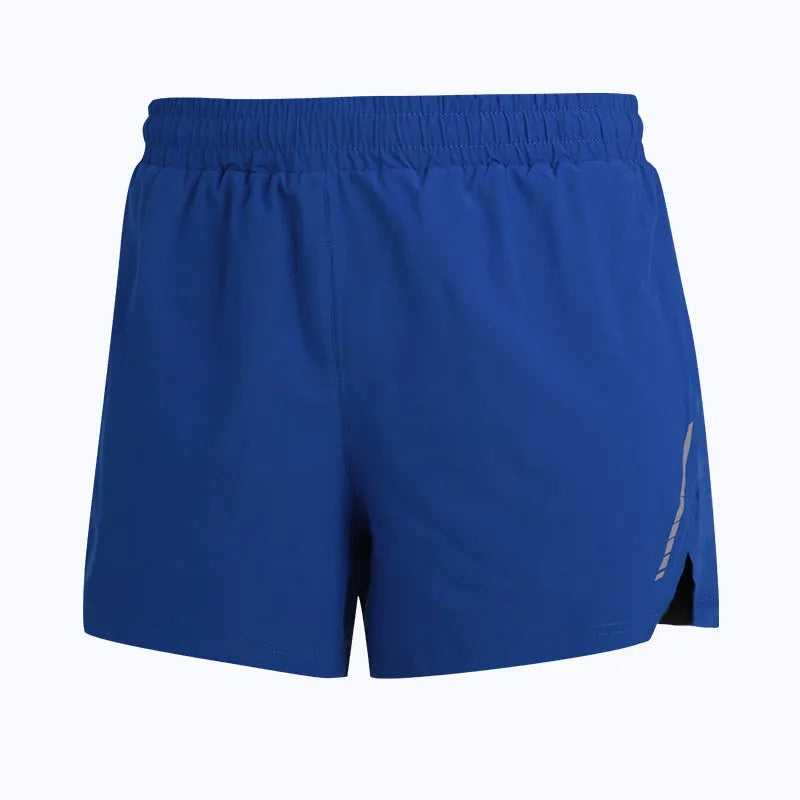 Man wearing gray quick-dry marathon running shorts, straight leg fit, for athletic training.