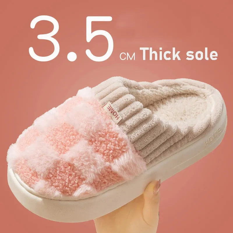 Plaid pattern women's plush slippers with round toe and flat heel on a coloured background.