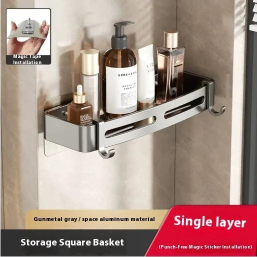 Gun grey punch-free bathroom corner storage rack with triangle basket mounted on wall.
