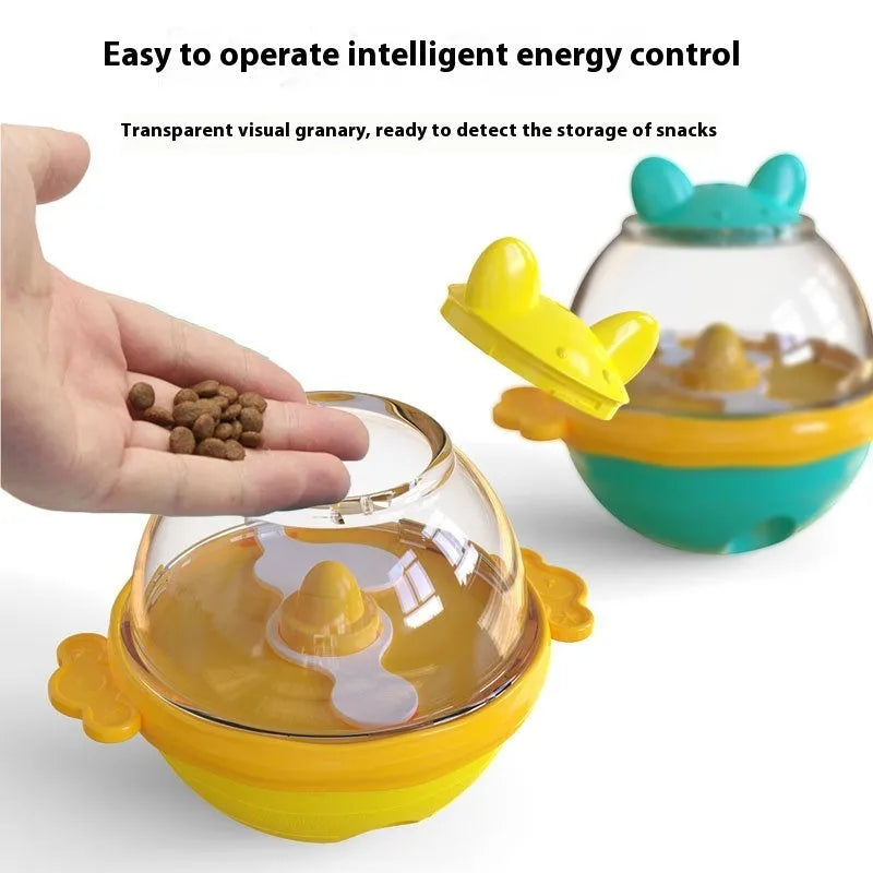 Yellow TPR pet food feeder tumbler toy for dogs measuring 11.2 x 13.9 x 12.2 cm