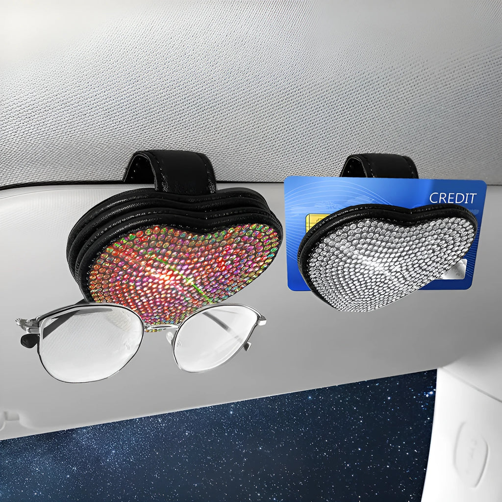 Black PU leather car sun visor clip with diamond accents holding sunglasses and a ticket.
