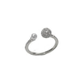 A simple geometric open-end ring with a round zircon stone, shown in gold and silver plated finishes.