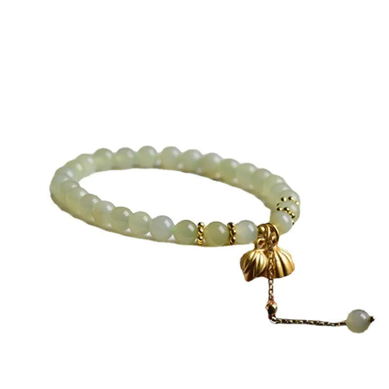 Shihuan natural Hetian jade bracelet with 6mm beads and a central fu character.