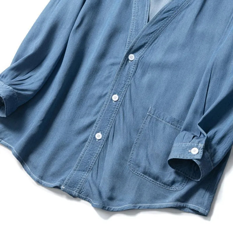 Men's dark blue three-quarter sleeve denim coat with V-neck collar and side pockets