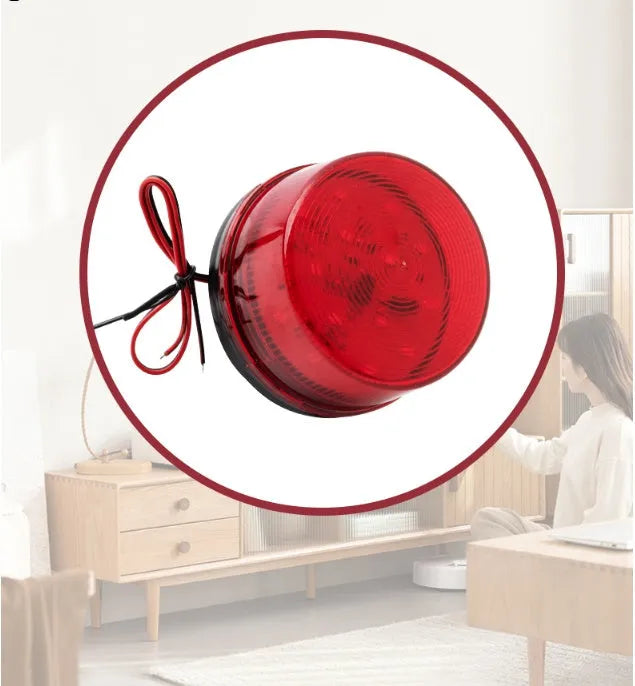 Small red warning alarm light with strobe flash, 73mm diameter, for 24V fire protection systems.