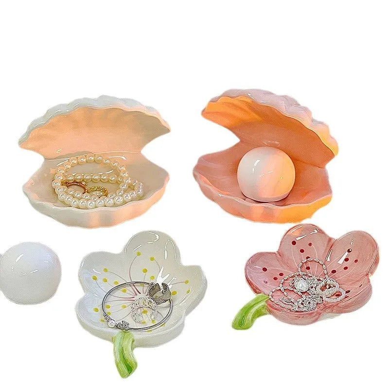 A white porcelain tray with a matching small night light, in pink or white, for a girl's bedroom.