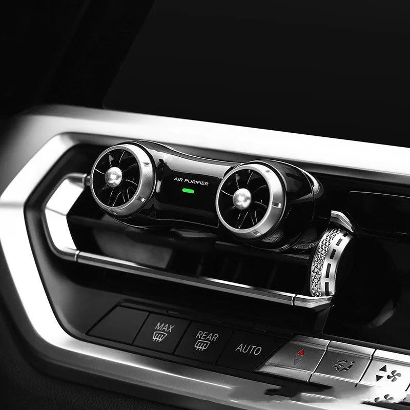 Compact black car air purifier with anion and aromatherapy functions for vehicle use