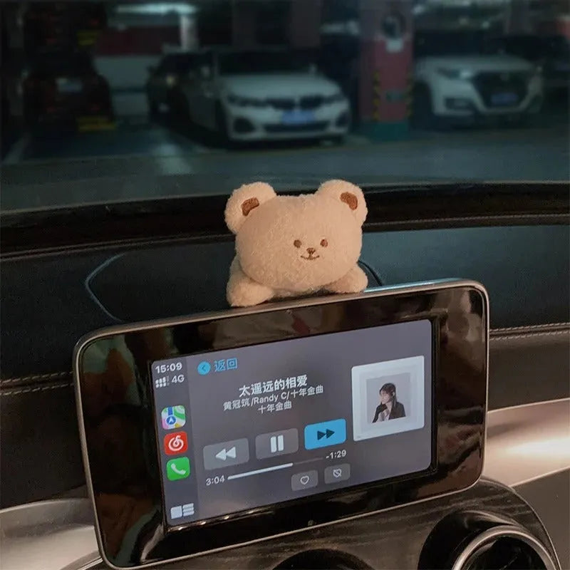 Soft fabric plush doll car decoration in cute bear and bunny cartoon designs.