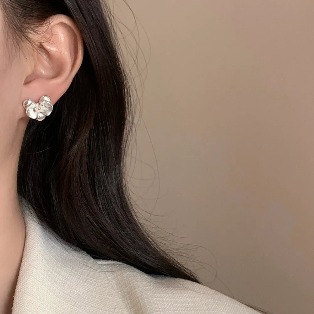 Retro flower earrings with petal design in gold and silver electroplated finishes
