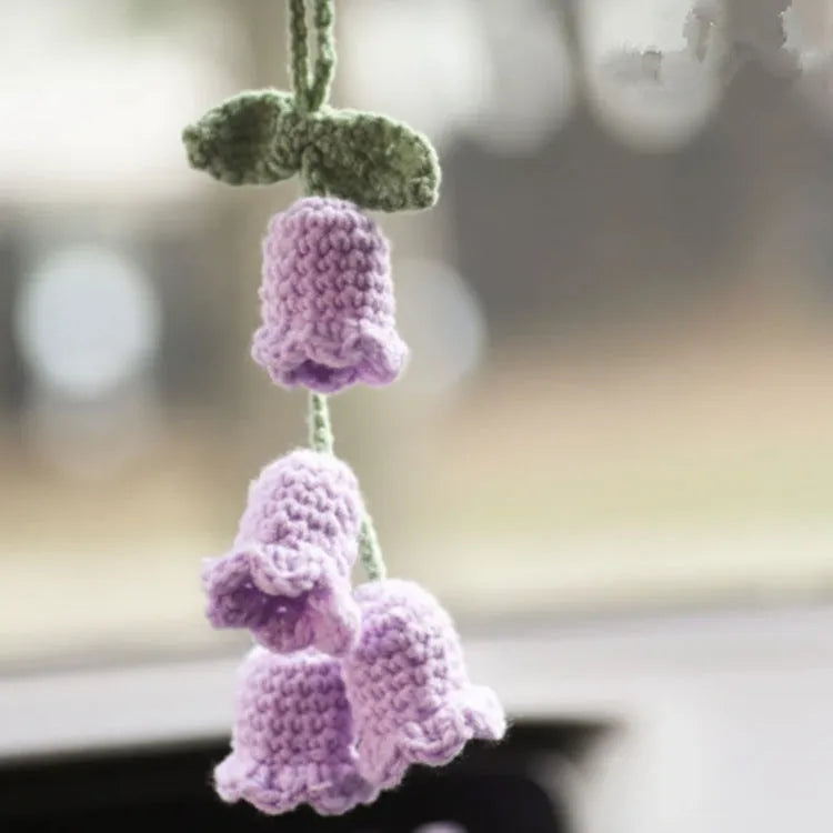 Green and white knitted wool car plant decoration with 8cm base and hanging rope.