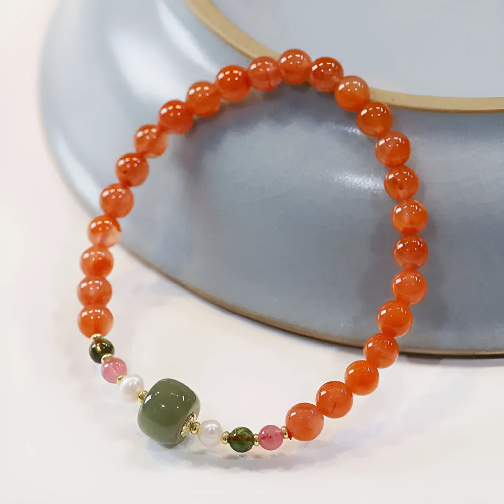 A round bead bracelet made from natural cherry red South Red Agate with a retro ethnic style.