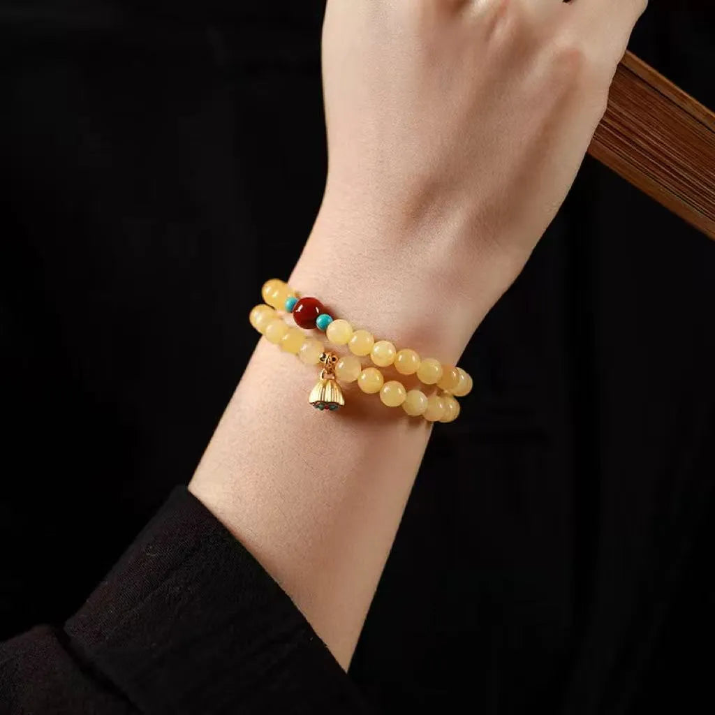 Handmade yellow jade double ring bracelet with lotus seedpod pattern and 8mm 6mm beads