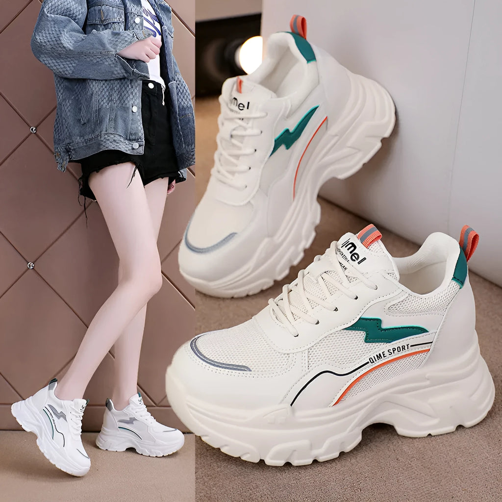 White women's lace-up dad shoes with cross straps and a breathable mesh upper.