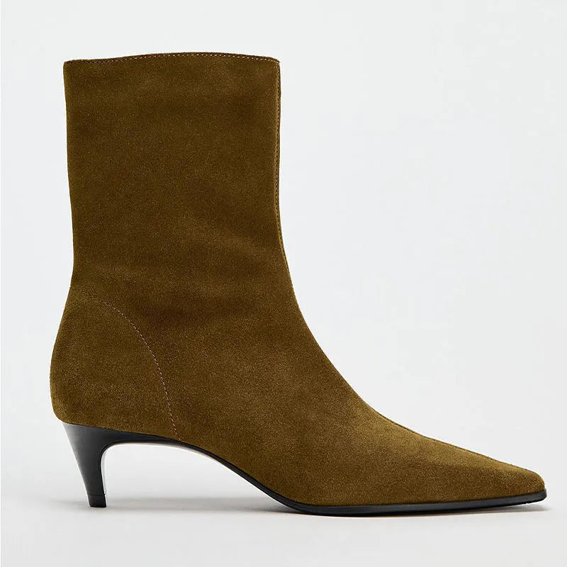 Brown square toe ankle boot with side zipper and a low kitten heel on a waterproof platform sole.