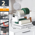 White double-layer kitchen storage rack with a removable plastic draining tray on the bottom shelf.