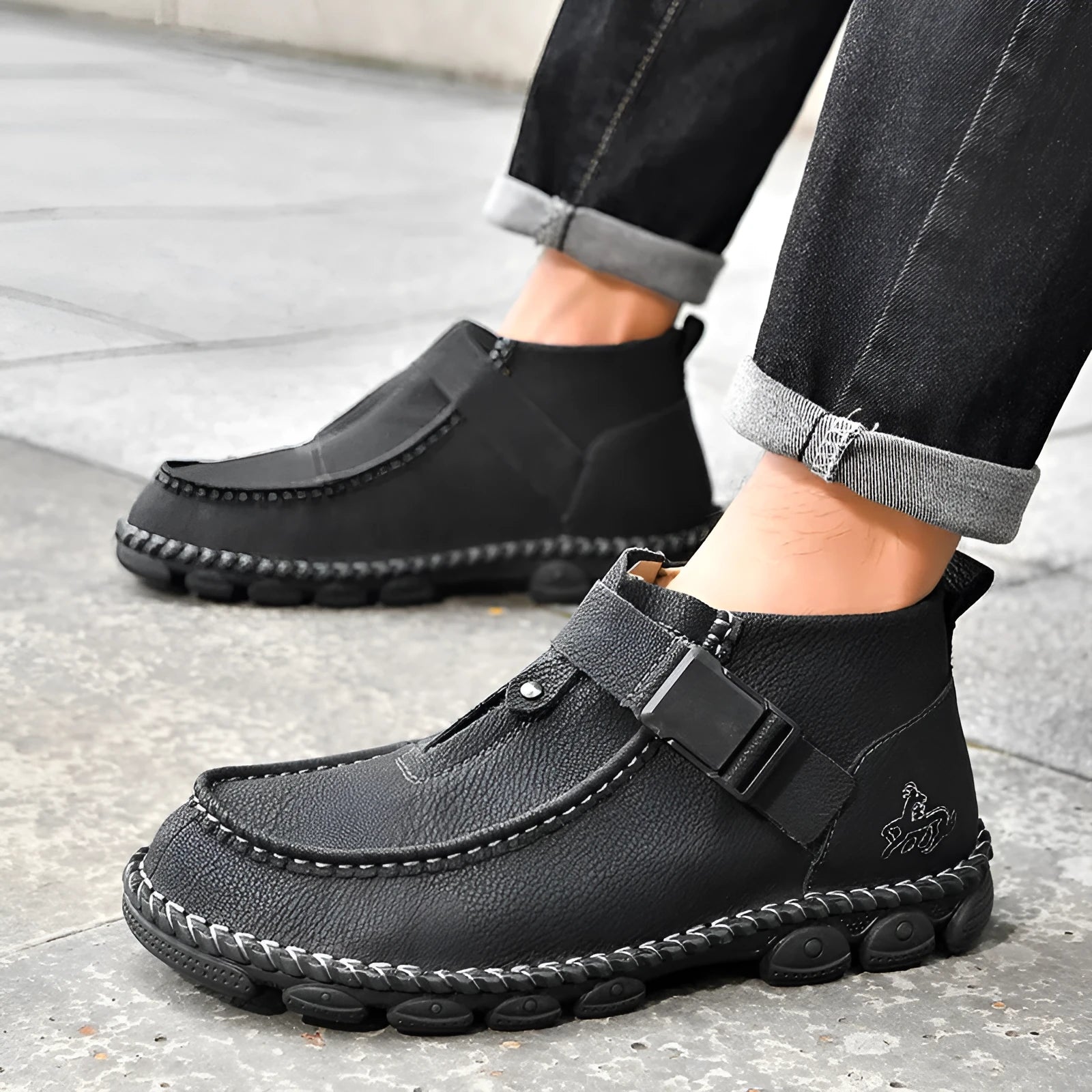 Men's black handmade stitching casual slip on shoes with flat rubber sole.