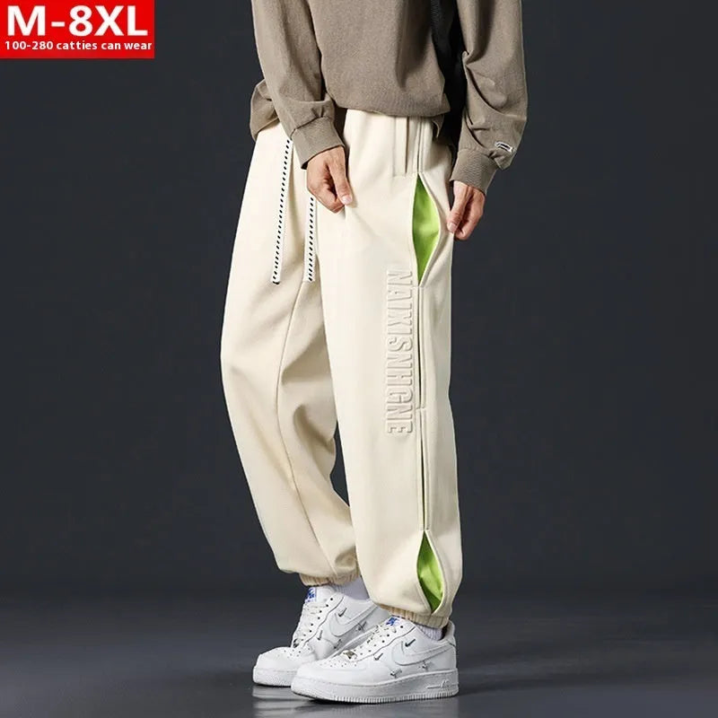 Men's cotton pants with ankle banded design and stitching details in black colour