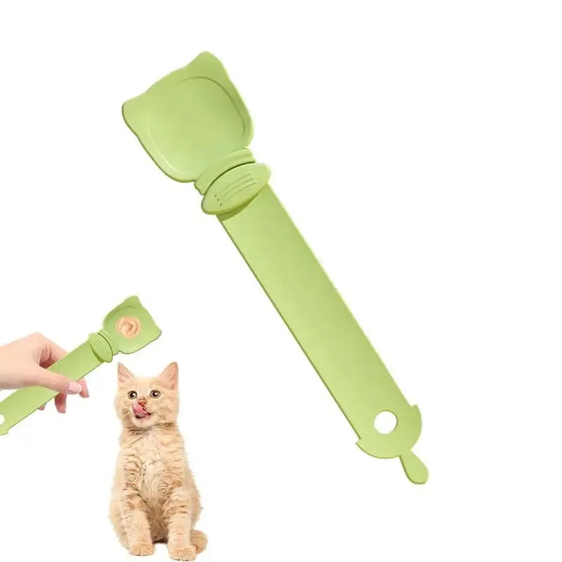 Cat strip feeder spoon in orange, green, and white, 27 x 6.5 cm reusable treat dispenser