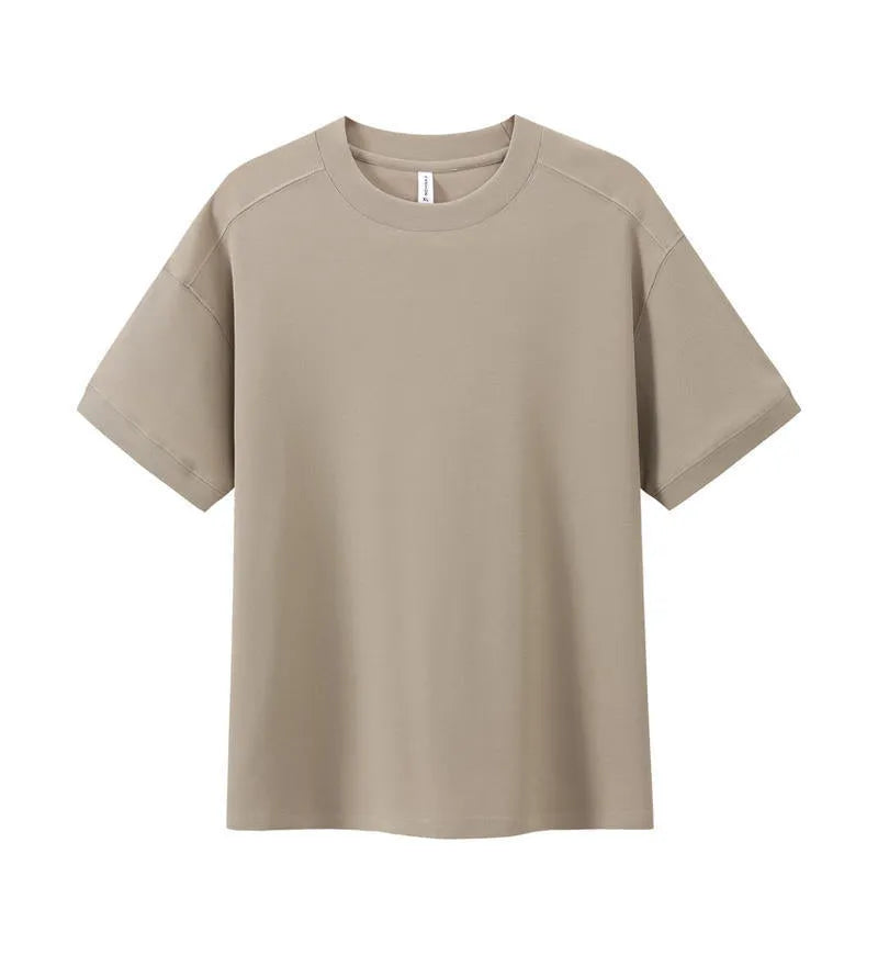 Short-sleeved loose-fit cotton pique T-shirt for youth in solid colour options