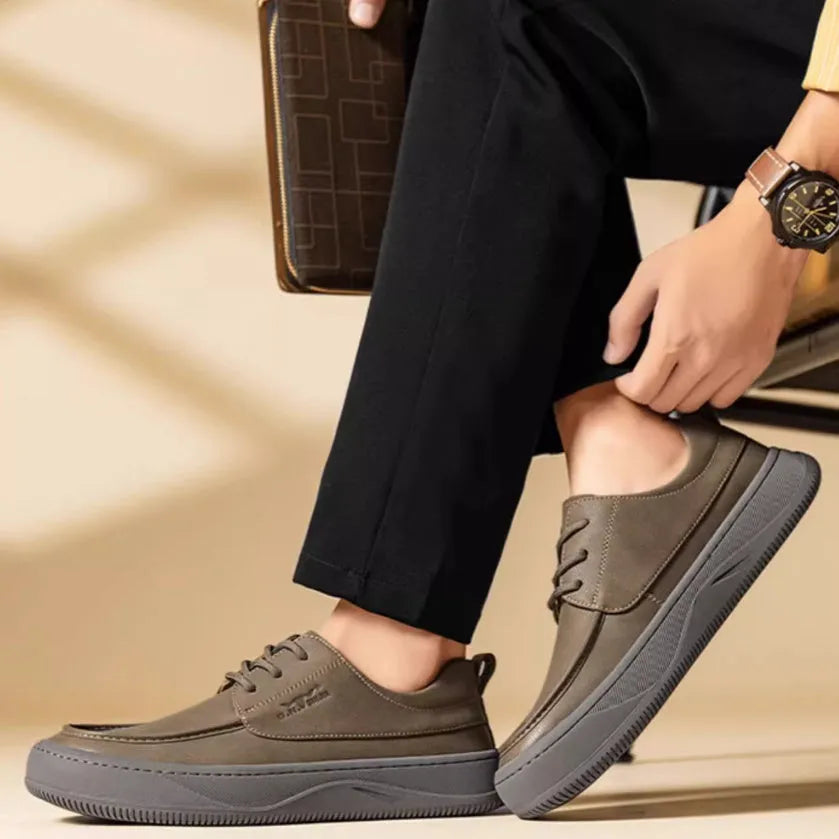 Brown leather retro casual shoes for men with a distinctive big toe design and visible stitching.
