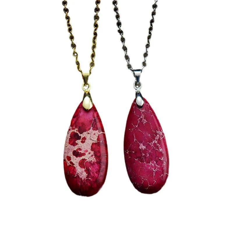 Emperor Stone jade pendant necklace on an 18k gold plated chain with a water drop shape.