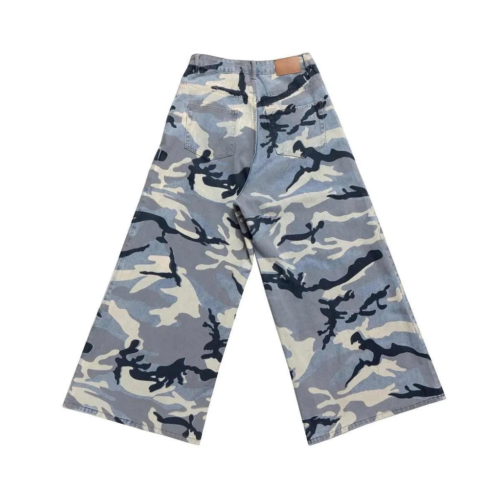 Snow camouflage blue loose fit denim jeans on a neutral background, showing mid-waist and relaxed leg cut.