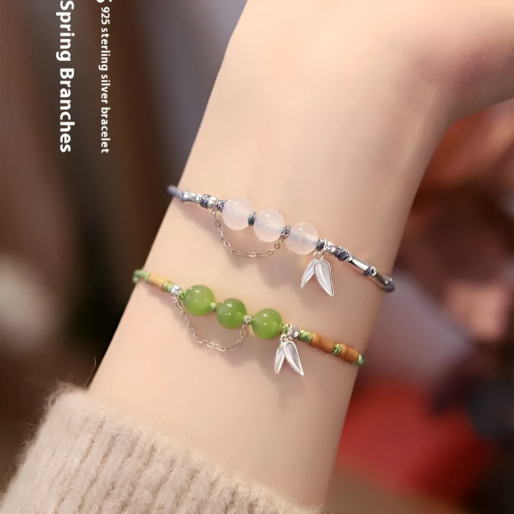 Women's Hetian jade bracelet with woven strap in diamond shape featuring lotus seedpod design