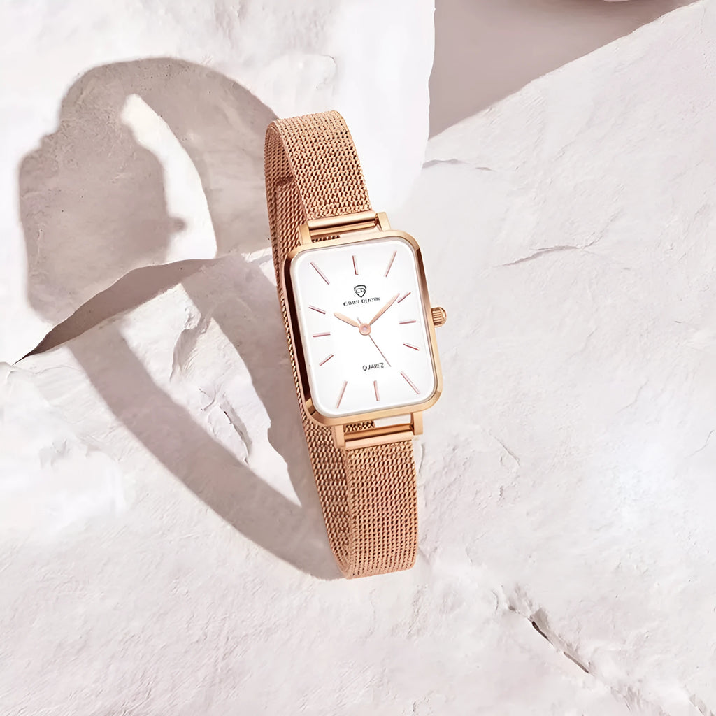 Women's waterproof quartz watch with woven steel strap in rose gold or silver.