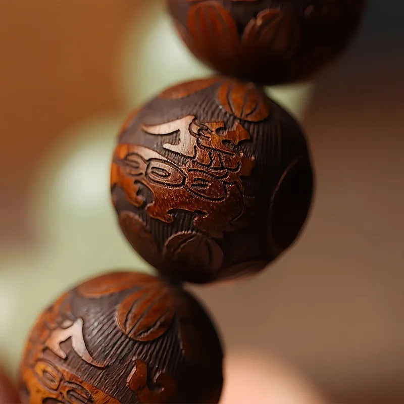 Wooden amass fortunes bracelet with carved Fu character design on rosewood