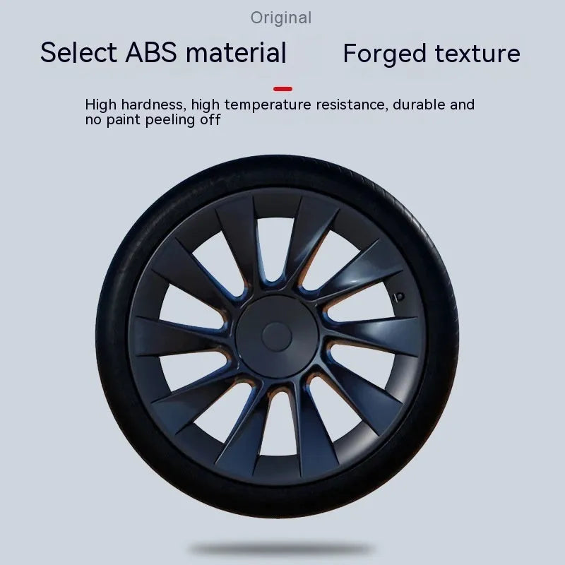 Set of four plastic Tesla Model Y wheel hub covers in black, white, red, and carbon fibre pattern.