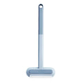 Multifunctional hair removal and window screen cleaning brush with blue flannel head and white plastic handle.