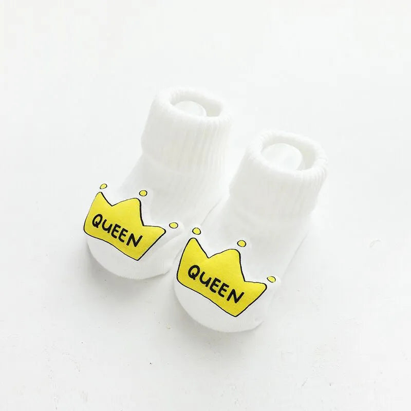 Baby socks with silicone anti-slip grips on sole, mid-height tube design in combed cotton
