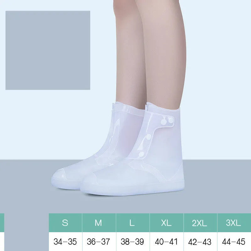 White PVC high-top reusable shoe covers for women, shown on feet.