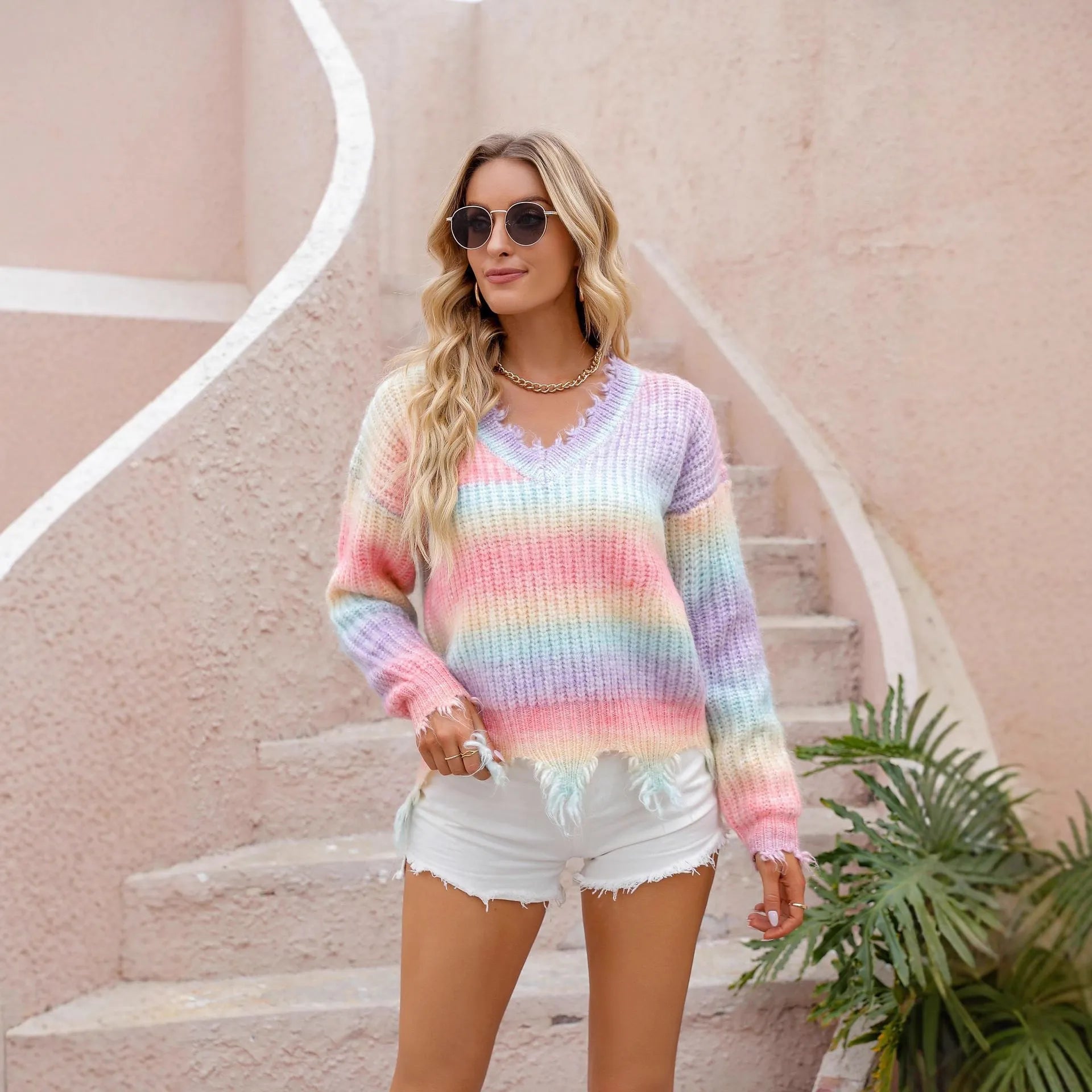 Pink rainbow gradient loose fit knitted sweater with tassel trim detail
