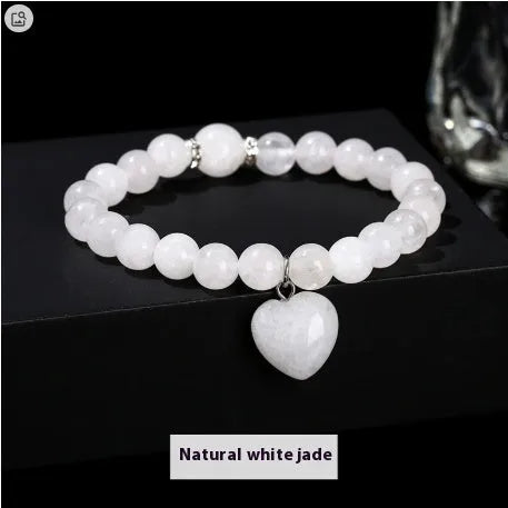 Handmade natural gemstone bracelet with tiger's eye, aventurine, and crystal beads in geometric round design
