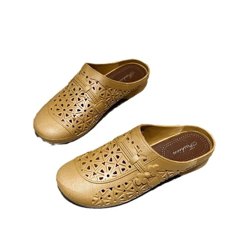 Adult flat toe box slippers in PVC with hollow-out design and faux fur collar.